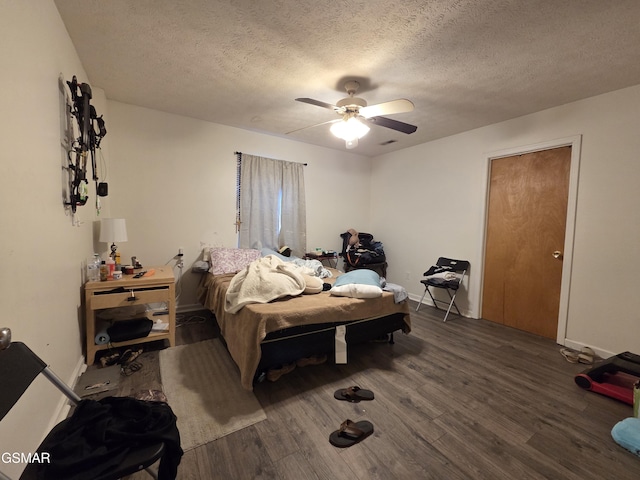 2865/2869 Happy Hollow Rd, Sevierville, TN 37862 - bedroom with wood finished floors, a textured ceiling, and a ceiling fan