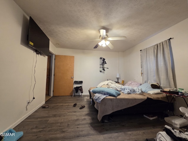 2865/2869 Happy Hollow Rd, Sevierville, TN 37862 - bedroom featuring a textured ceiling, wood finished floors, and a ceiling fan