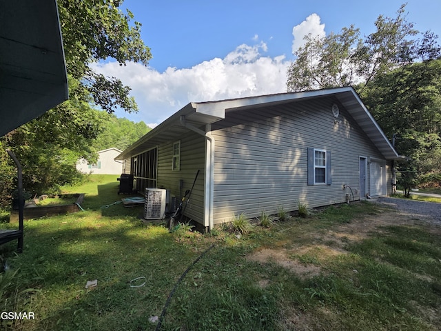 2865/2869 Happy Hollow Rd, Sevierville, TN 37862 - view of home's exterior with a garage, a yard, and driveway