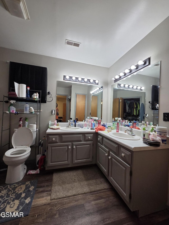 2865/2869 Happy Hollow Rd, Sevierville, TN 37862 - bathroom featuring wood finished floors and double vanity