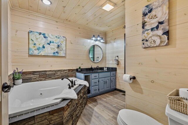 bathroom with hardwood / wood-style flooring, toilet, and wood walls