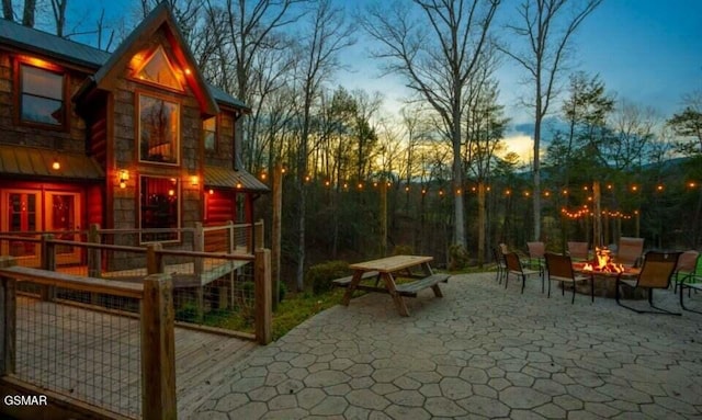 2716 Dayne Dr, Sevierville, TN 37862 - view of patio / terrace featuring an outdoor fire pit