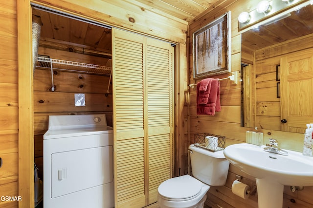 822 Eagle Cove Way, Gatlinburg, TN 37738 - bathroom with washer / clothes dryer, wooden walls, and wooden ceiling