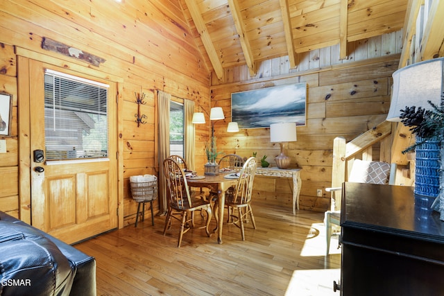822 Eagle Cove Way, Gatlinburg, TN 37738 - dining room featuring wooden walls, light wood-type flooring, and wood ceiling