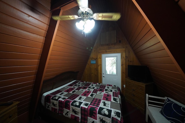 unfurnished bedroom featuring wood walls, wooden ceiling, and lofted ceiling