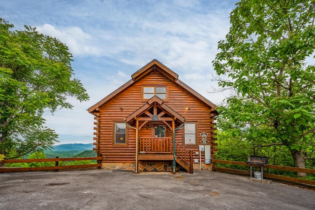 log-style house with a mountain view