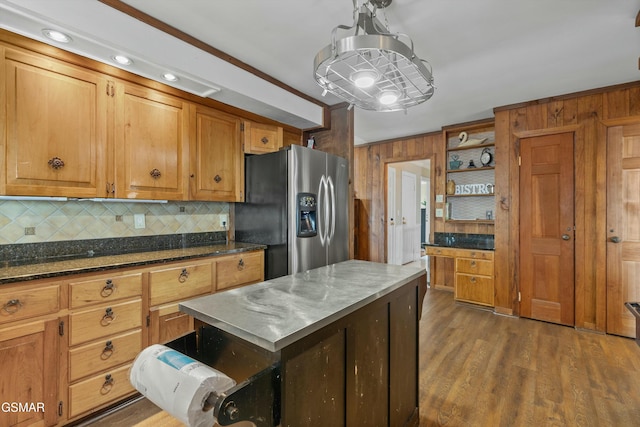 kitchen with brown cabinets, stainless steel refrigerator with ice dispenser, open shelves, decorative backsplash, and dark wood-type flooring