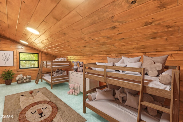 carpeted bedroom featuring wood ceiling, wooden walls, and vaulted ceiling