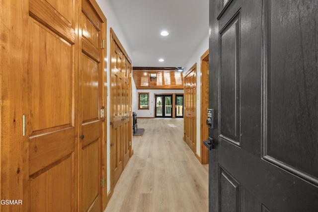 hallway featuring recessed lighting and light wood finished floors