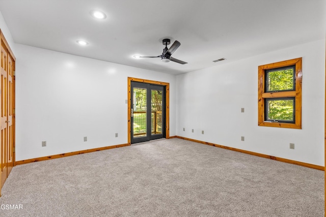 unfurnished room with recessed lighting, visible vents, a ceiling fan, carpet flooring, and baseboards