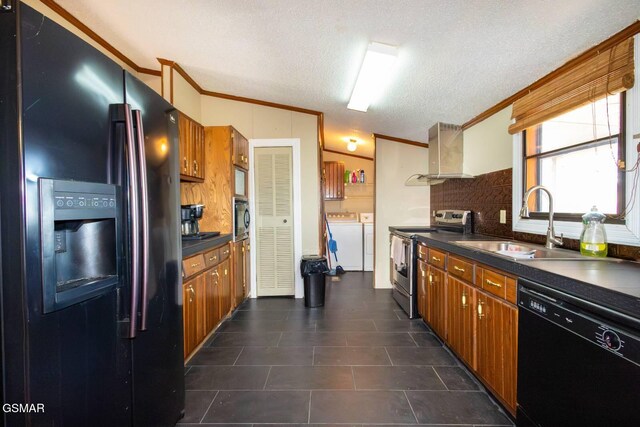 1369 Paradise Ln, Dandridge, TN 37725 - kitchen featuring black appliances, washer and dryer, dark countertops, ventilation hood, and ornamental molding