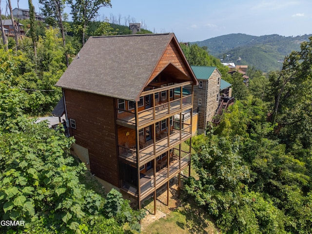 view of building exterior featuring a mountain view