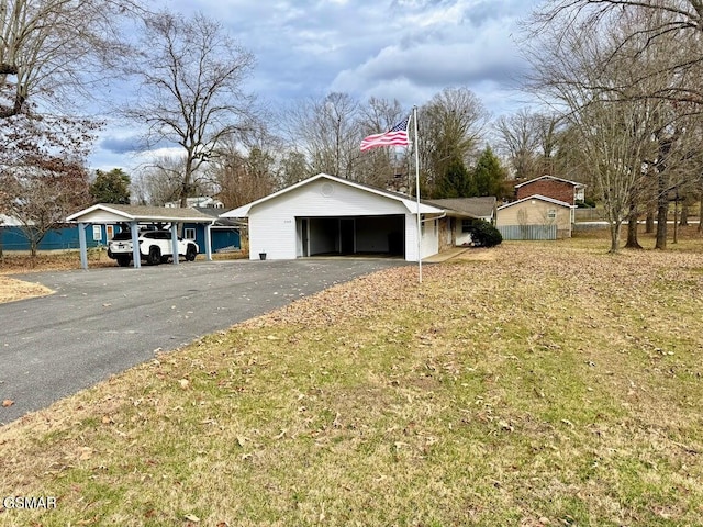 garage featuring a carport