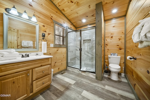 bathroom featuring a stall shower, wooden walls, toilet, wood ceiling, and wood finished floors