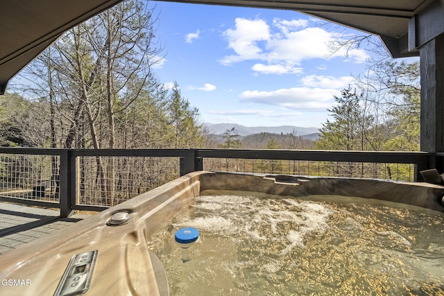 wooden terrace featuring a mountain view