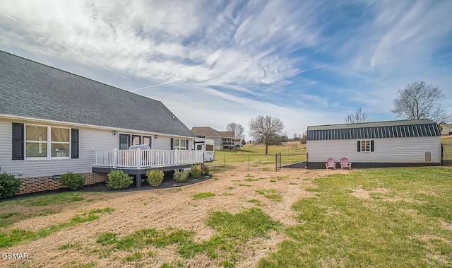 view of yard with a deck