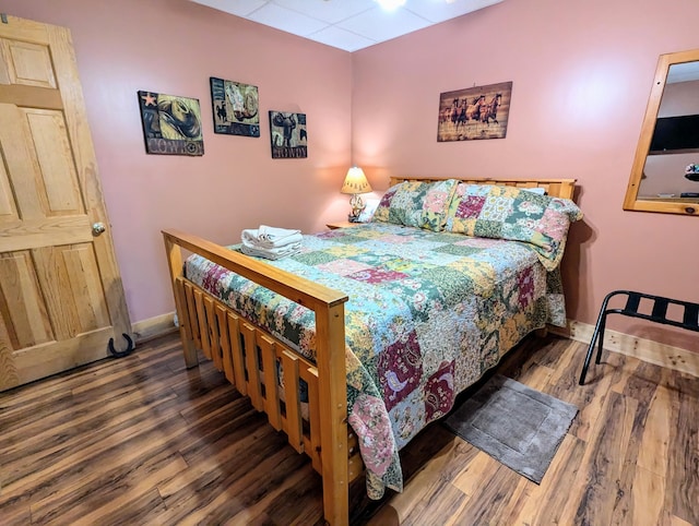 bedroom featuring dark hardwood / wood-style floors