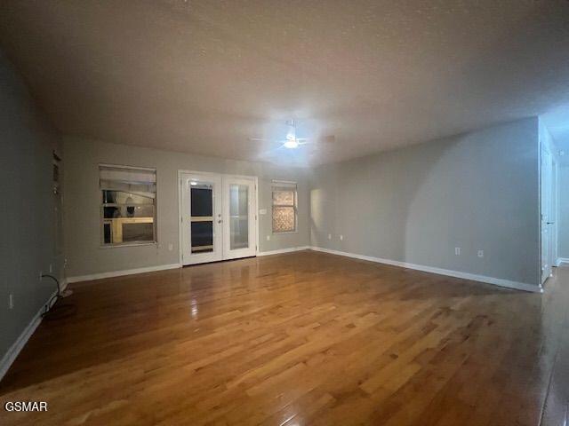 734 Southview Cir, Kodak, TN 37764 - unfurnished living room featuring wood finished floors and baseboards