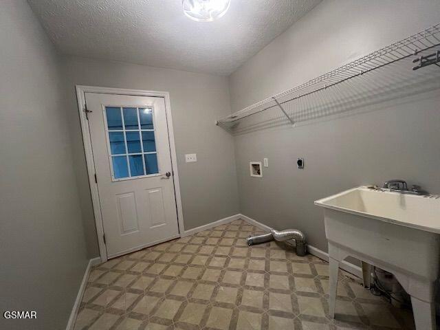 734 Southview Cir, Kodak, TN 37764 - washroom featuring electric dryer hookup, hookup for a washing machine, baseboards, and light floors