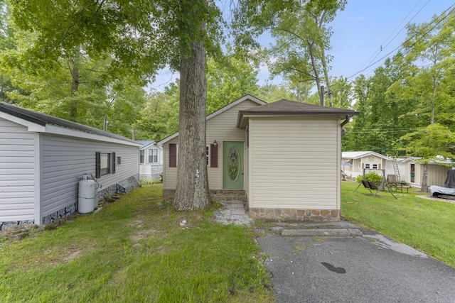 exterior space with a front lawn