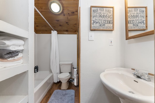 full bathroom with hardwood / wood-style floors, shower / bath combo, wooden ceiling, sink, and toilet