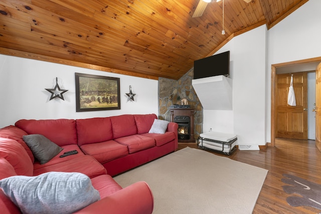 living room featuring dark hardwood / wood-style flooring, wood ceiling, vaulted ceiling, ceiling fan, and a stone fireplace