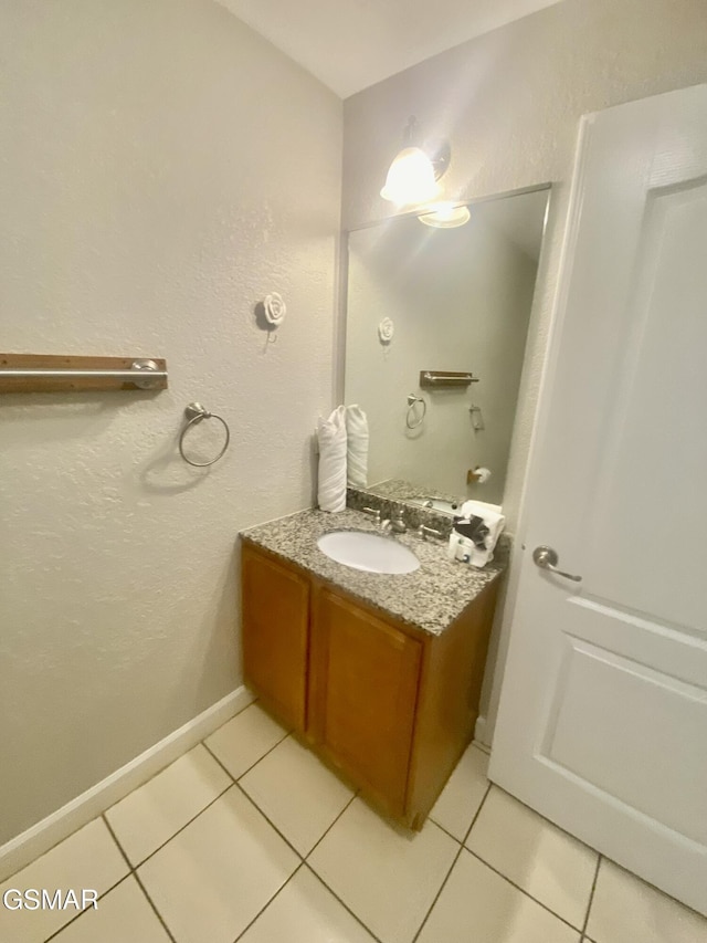 124 Plaza Dr Unit 3107, Pigeon Forge, TN 37863 - bathroom with vanity, tile patterned floors, and baseboards