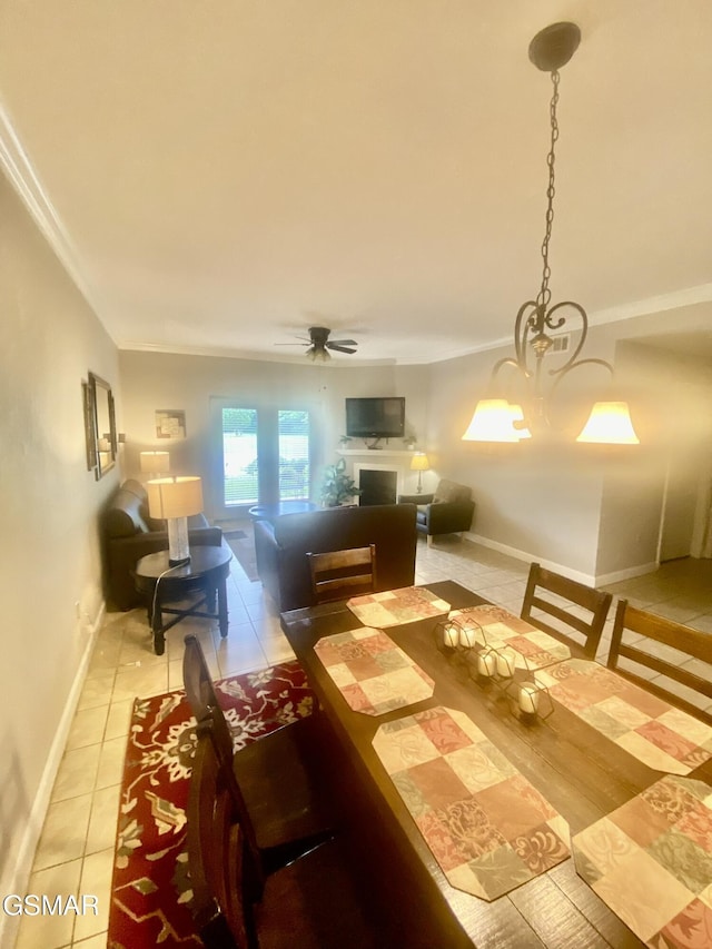 124 Plaza Dr Unit 3107, Pigeon Forge, TN 37863 - dining space with light tile patterned floors, ornamental molding, baseboards, and ceiling fan