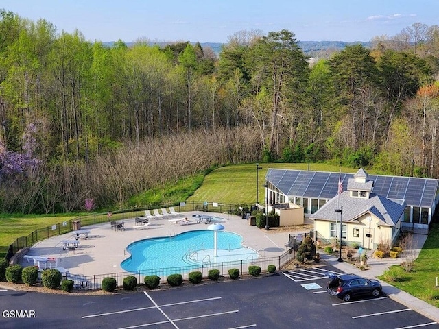 124 Plaza Dr Unit 3107, Pigeon Forge, TN 37863 - view of subject property featuring a pool area and a heavily wooded area