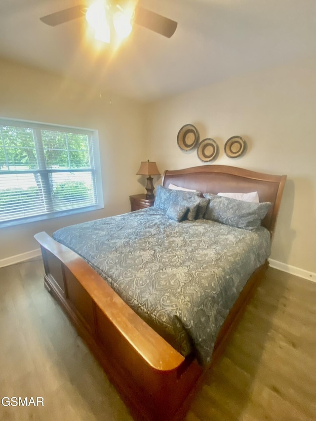 124 Plaza Dr Unit 3107, Pigeon Forge, TN 37863 - bedroom with wood finished floors, baseboards, and ceiling fan
