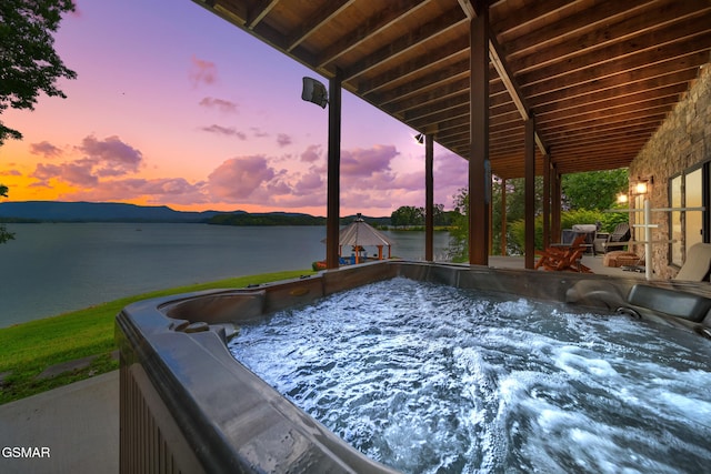 3995 Island View Way, Sevierville, TN 37876 - view of swimming pool featuring a water view and a hot tub