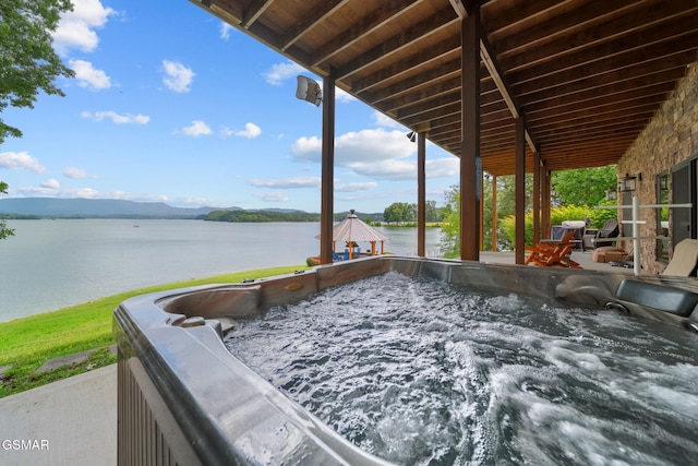 3995 Island View Way, Sevierville, TN 37876 - view of patio featuring a water view and a hot tub