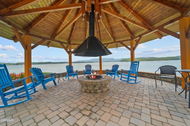 3995 Island View Way, Sevierville, TN 37876 - view of patio featuring a fire pit, a gazebo, and a water view