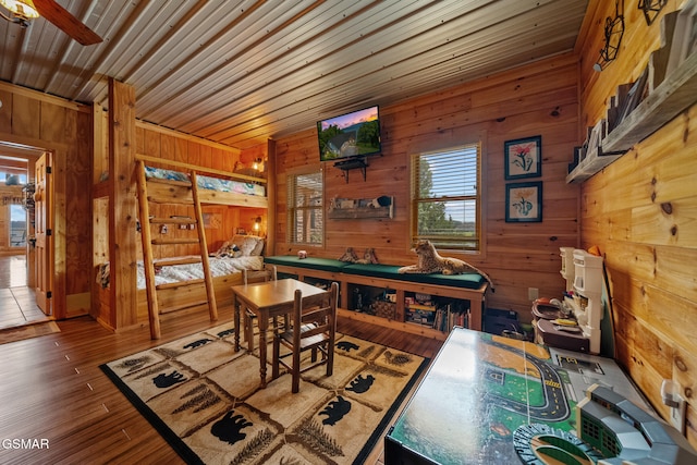 3995 Island View Way, Sevierville, TN 37876 - dining room featuring wood walls, wood finished floors, and a ceiling fan