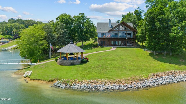 3995 Island View Way, Sevierville, TN 37876 - back of house featuring a gazebo, a water view, and a lawn