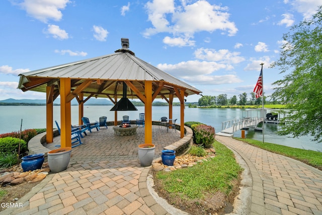3995 Island View Way, Sevierville, TN 37876 - view of patio / terrace with a gazebo, an outdoor fire pit, a water view, and a boat dock