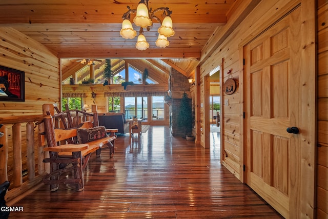 3995 Island View Way, Sevierville, TN 37876 - foyer featuring wooden walls, lofted ceiling, wood ceiling, hardwood / wood-style flooring, and a chandelier