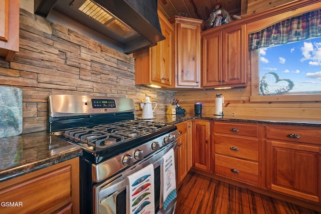 3995 Island View Way, Sevierville, TN 37876 - kitchen with stainless steel gas range, wall chimney range hood, brown cabinets, dark wood-type flooring, and wood ceiling