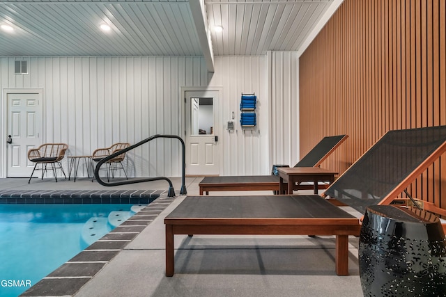 interior space with a hot tub