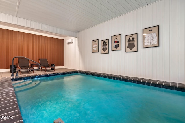 indoor pool featuring a wall mounted AC