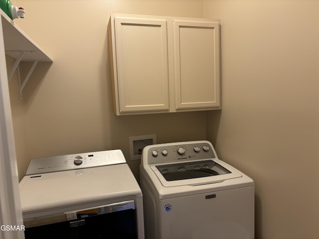 147 Padgett Mill Rd, Cosby, TN 37722 - laundry area with washing machine and dryer and cabinet space