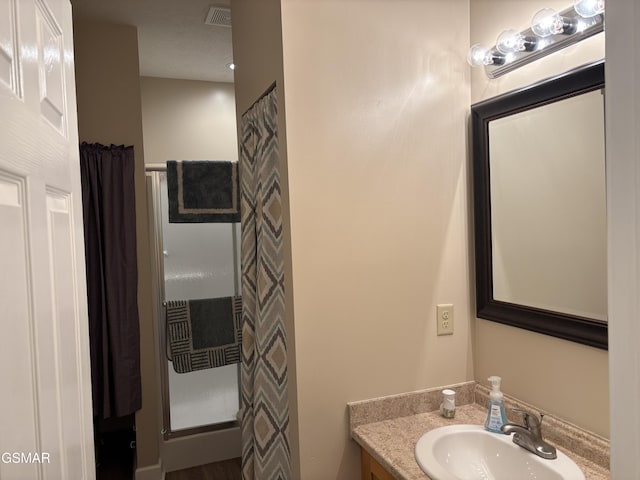 147 Padgett Mill Rd, Cosby, TN 37722 - bathroom featuring a shower with curtain, vanity, and visible vents