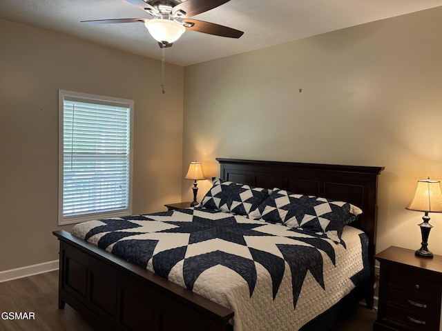 147 Padgett Mill Rd, Cosby, TN 37722 - bedroom featuring a ceiling fan, baseboards, and dark wood-style flooring