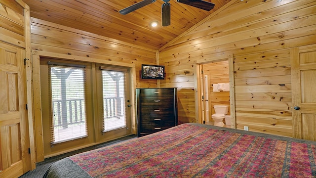 bedroom with wood walls, ensuite bathroom, vaulted ceiling, ceiling fan, and wood ceiling