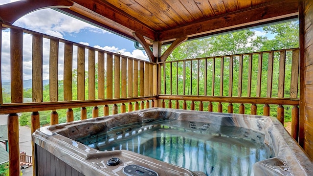 deck with a hot tub