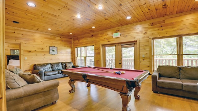 playroom featuring wood walls, light hardwood / wood-style flooring, wooden ceiling, and billiards