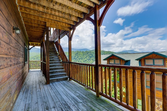 wooden terrace with a mountain view