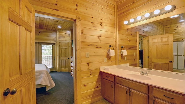 bathroom with vanity, wooden ceiling, and wood walls