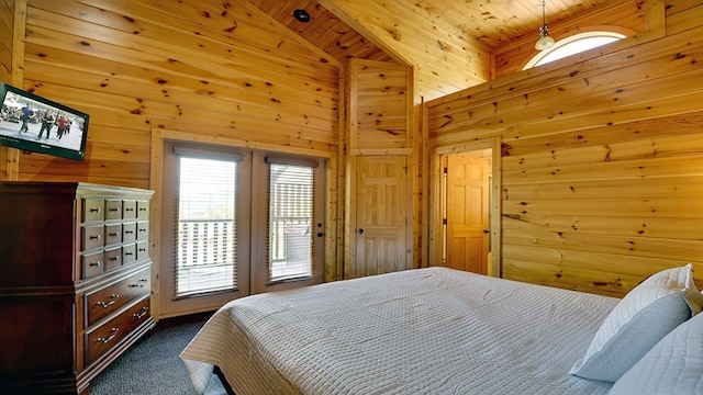 bedroom with dark colored carpet, wood walls, wooden ceiling, and high vaulted ceiling