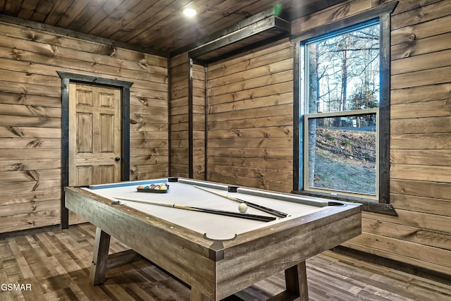 rec room featuring pool table, wooden ceiling, wood finished floors, and wooden walls